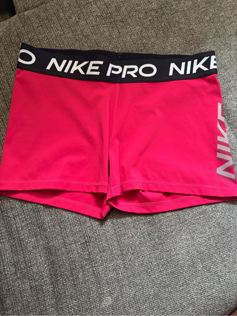 Nike Pro Women's Hot Pink Athletic Compression Shorts with Black Waistband